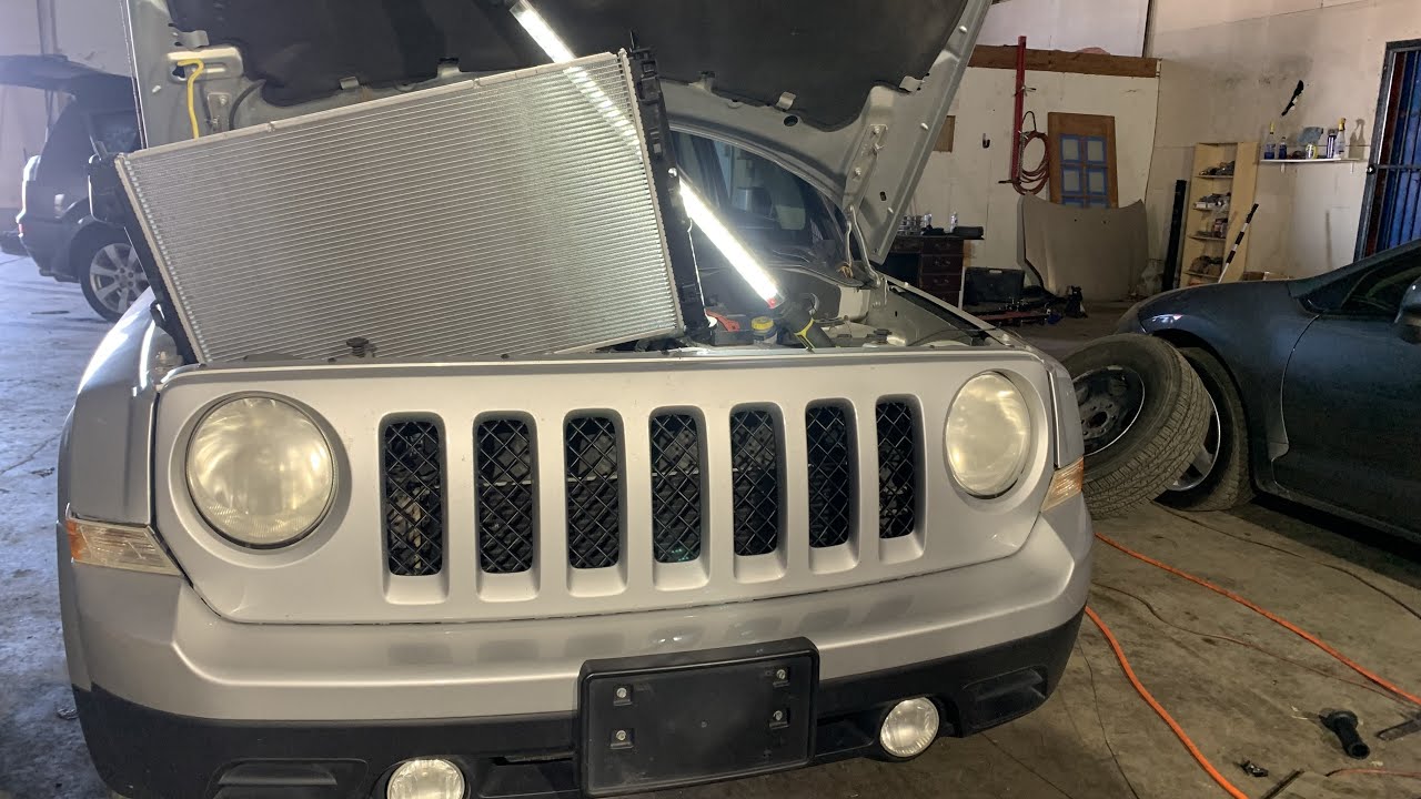 Замена радиатора Jeep Patroon 2013 года