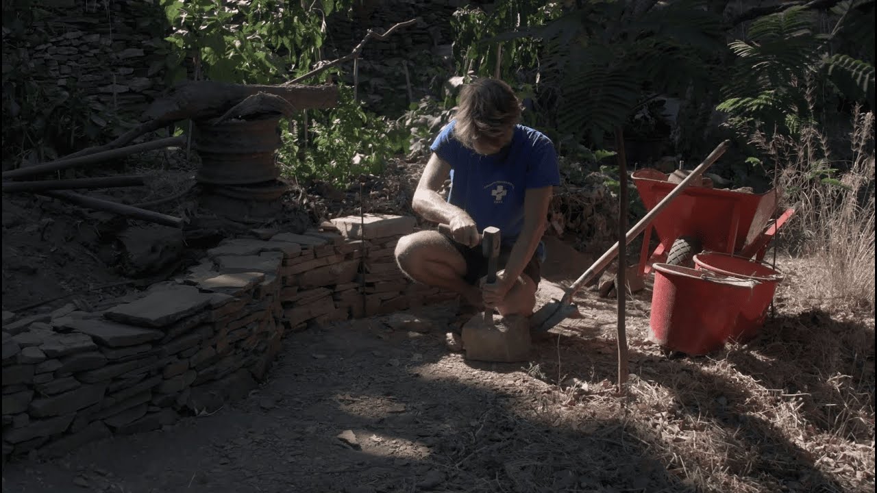 Morning, building a small dry stone retaining wall