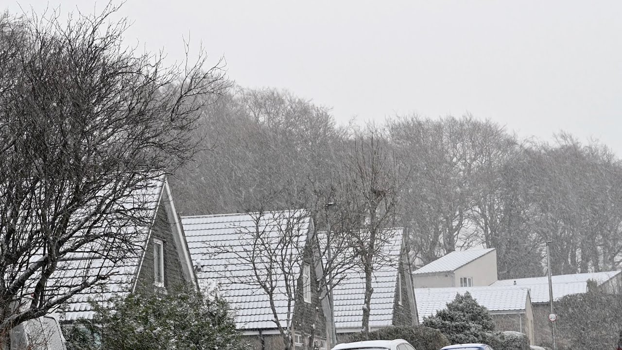 First snowfall of December in Edinburgh Scotland