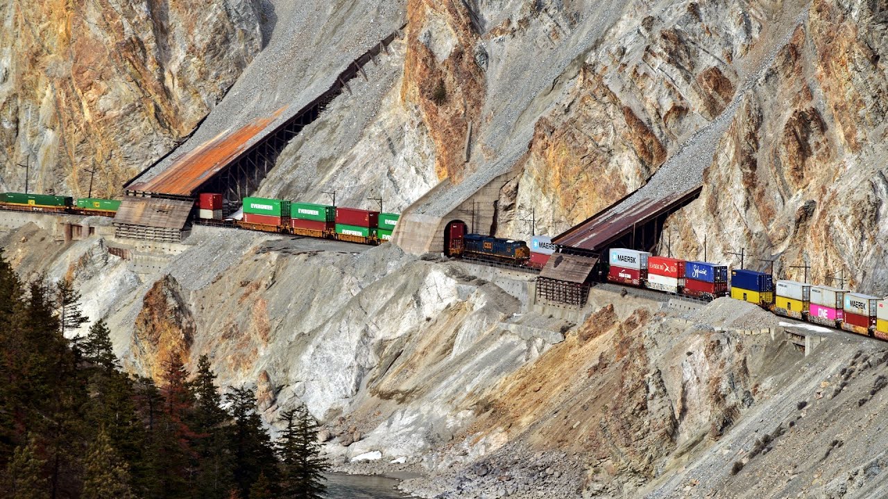 Double Stack Train Goes By Dangerous Rock Slide Tunnels and Bridges Along Canada&rsquo;s Canyon!
