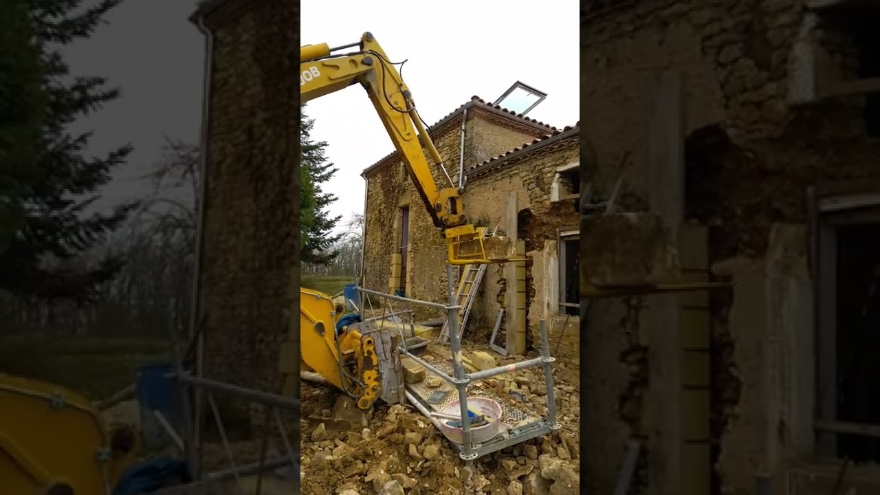 d&eacute;molition avec un pelle multijob