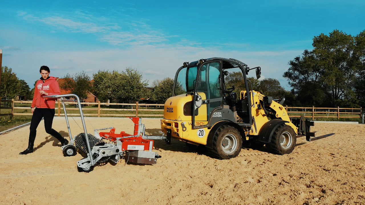 Kneilmann Gerätebau GmbH,  Reitbahnplaner für Hoflader und ATV, Gitterwalze