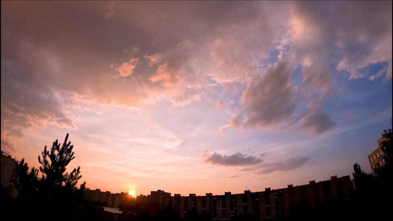 HomeLapse video - cloud movement, rain, storm, color rainbow and sunset | Slovakia | Košice city