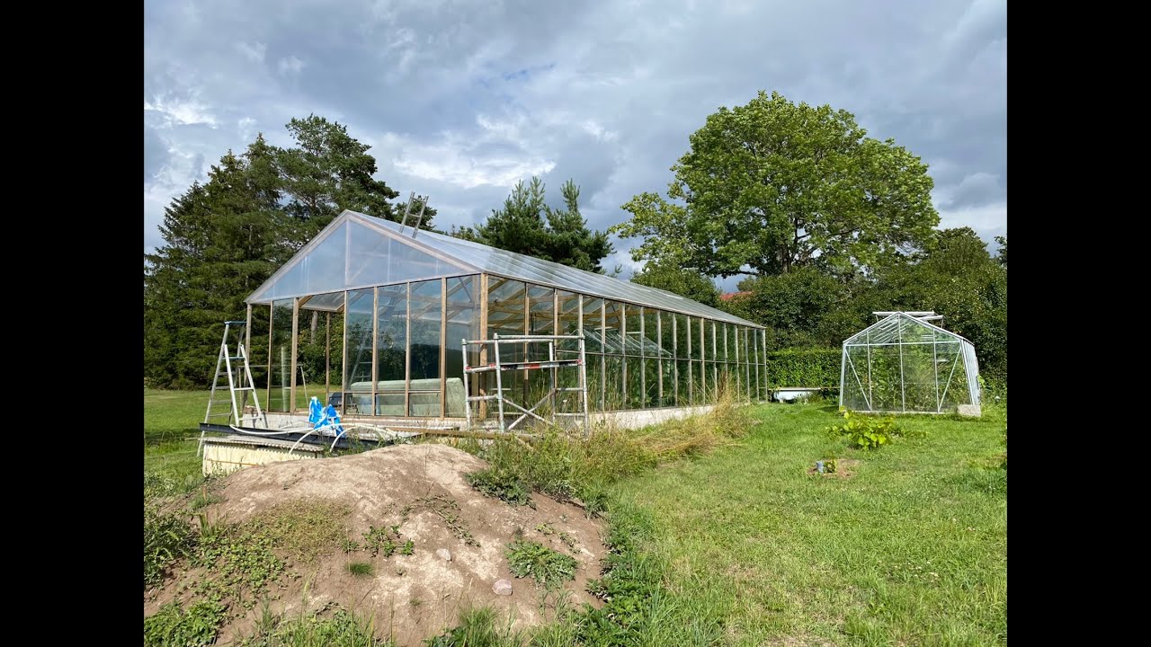 Växthus solceller golvvärme kamin 3glas