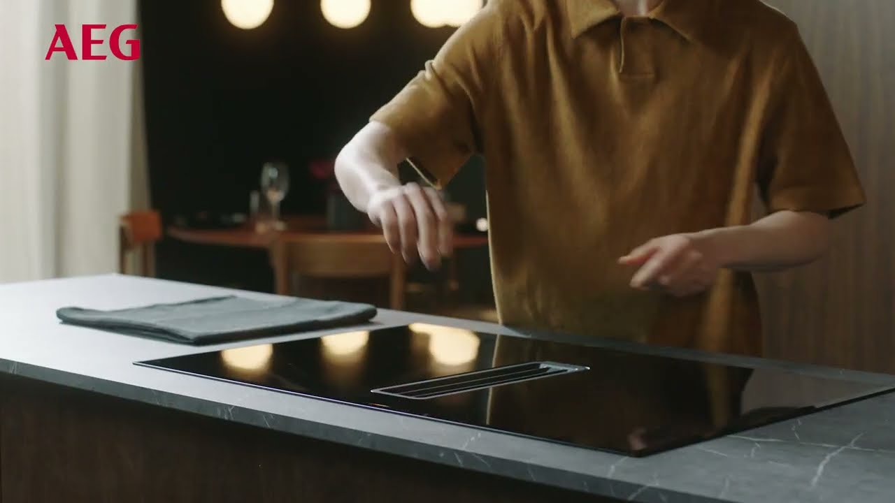 Hoe reinig ik de filters van mijn AEG kookplaat met afzuiging?