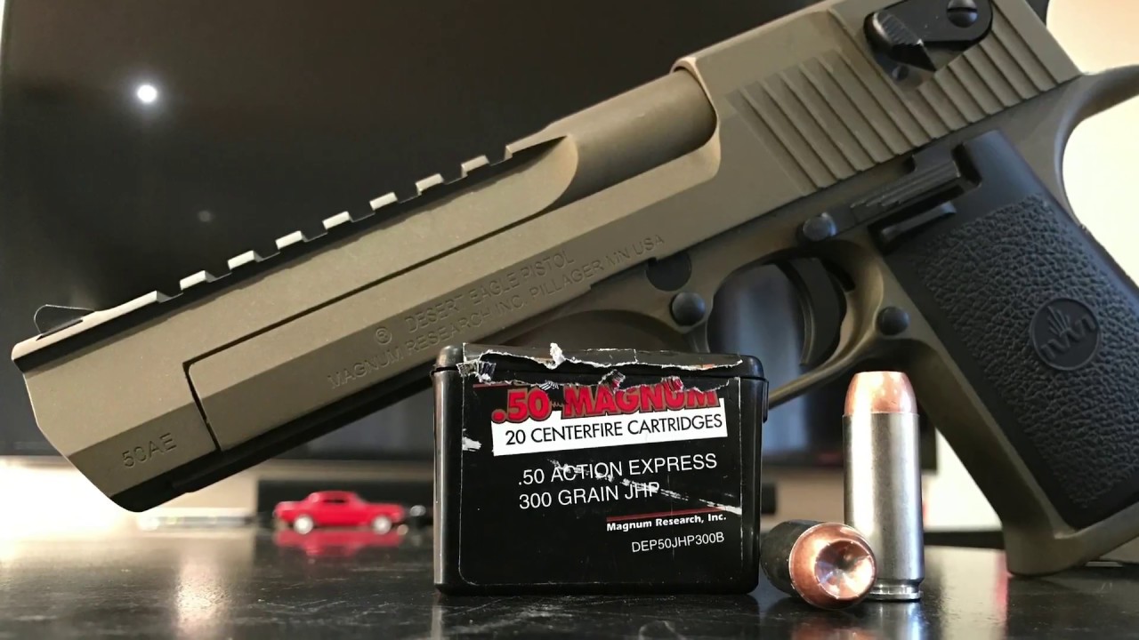 How to change a Desert Eagle barrel from .44 to .50 cal AE and one handed firing (burnt bronze)