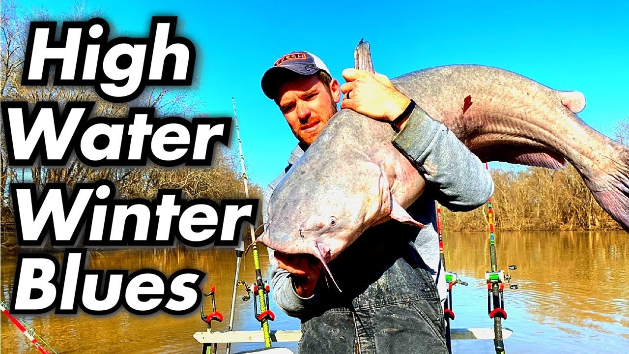 BIG BLUE CATFISH in dangerous waters from a tiny boat!!