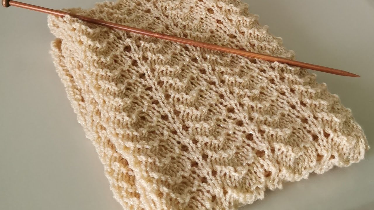 Tutorial punto traforato a maglia. Sciarpa autunnale. Variante semplice punto ventaglio