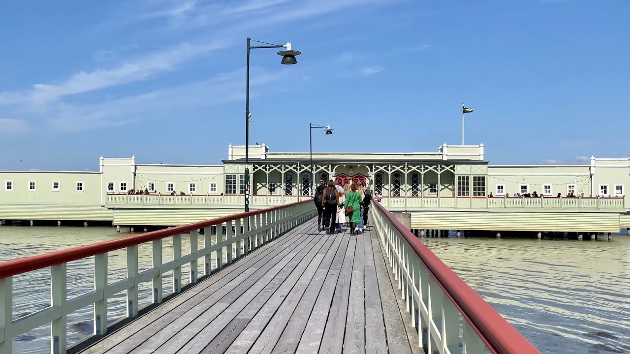 Malmö, Sweden: Biking to landmark Ribersborg Kallbadhus. Along the beach to bath house from 1898