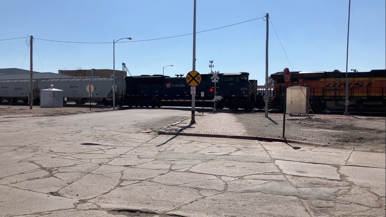 BNSF 7552 Grain Train w/ MRL 4319 Montana Rail Link Heritage West, Main St. RR Crossing, Fremont NE