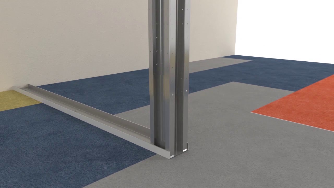 RAUMAN SLIDING GLASS DOOR INSERTED IN A SOLID MODULAR PARTITION WALL