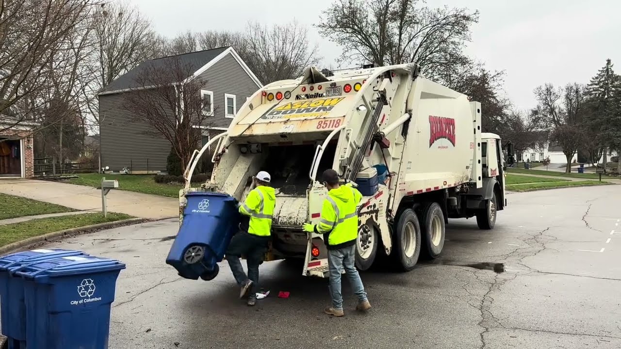 Rumpke Mack LR McNeilus rear loader on post-Christmas recycling