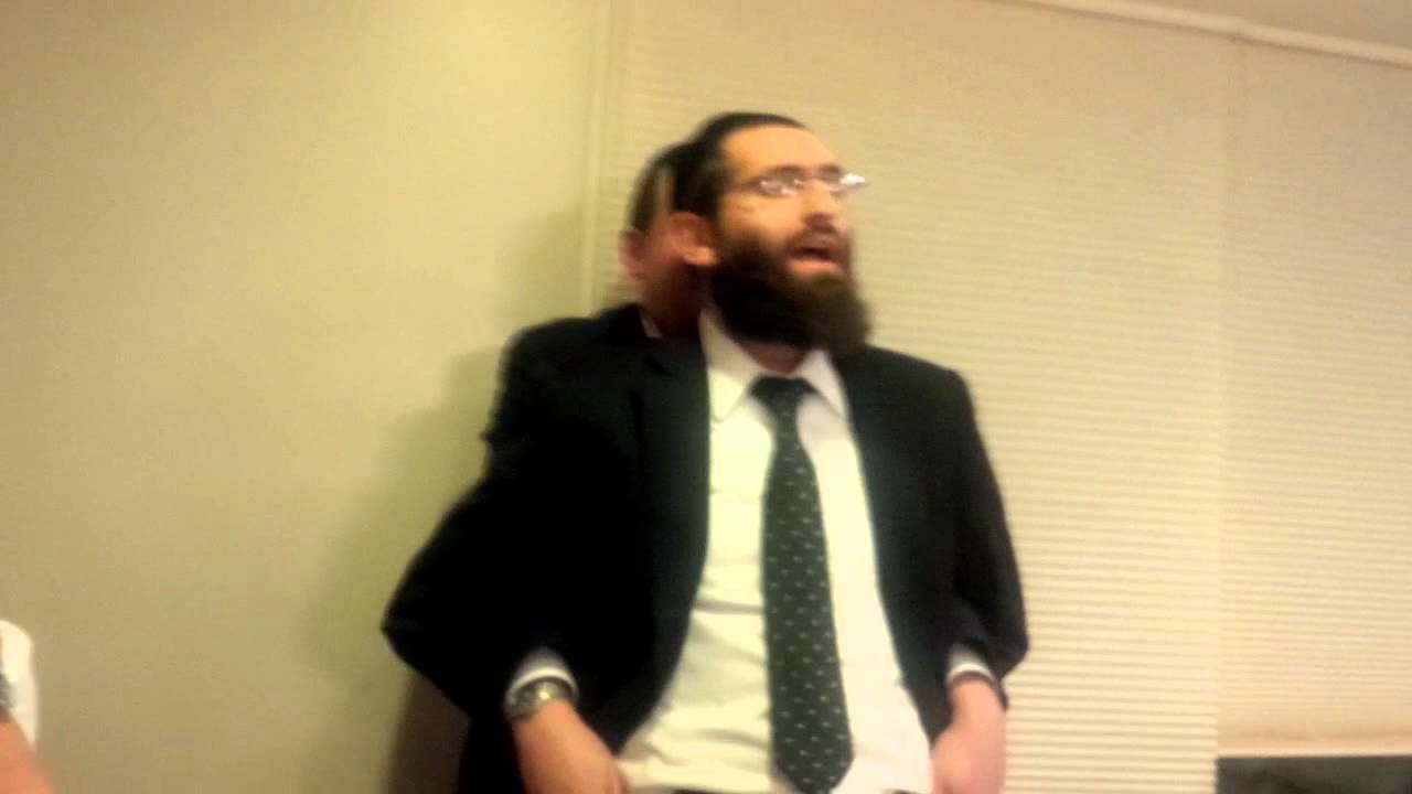 Funny guy speaking at a Sheva Brachos