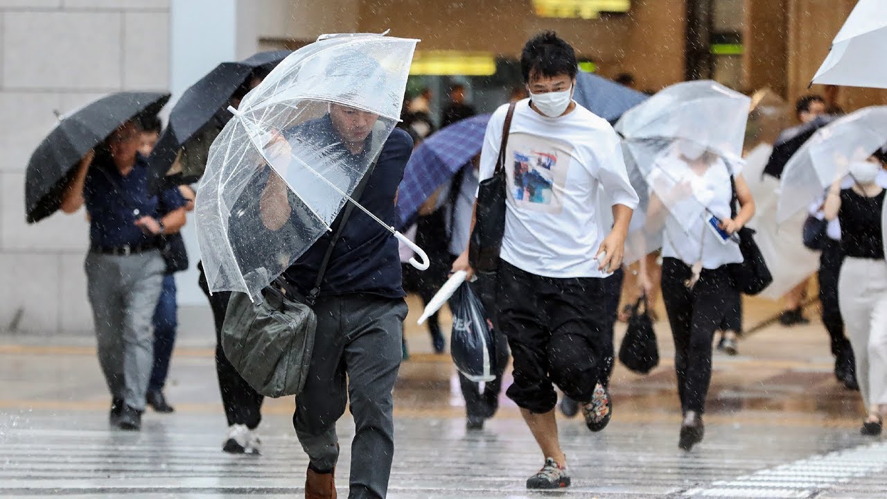 Travel disruptions and heavy rain as storm Lan hits Japan