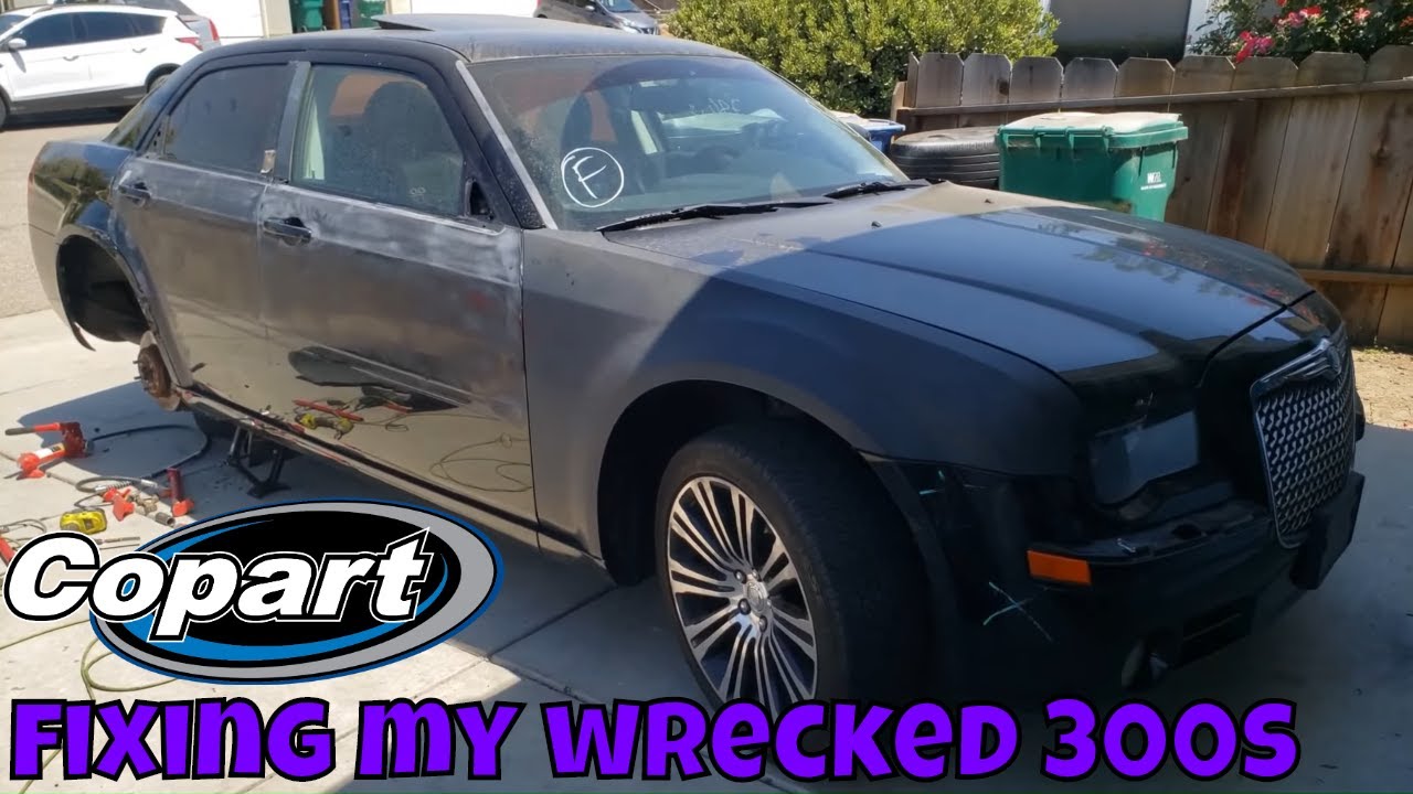 Rebuilding the cheapest wrecked chrysler 300s @ COPART AUTO AUCTIONS pt3