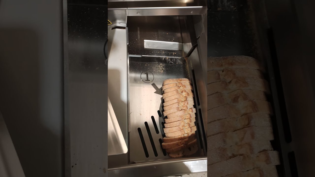 Bread slicer machine at Lidl. Warning: This sounds like it was taken from a horror movie!