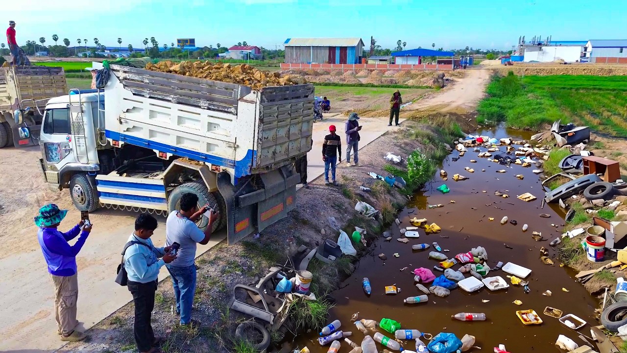 WOW Smooth Landfill Process!! Dump Truck 5T & 25T Unload & Dozer D31P Filling a Canal