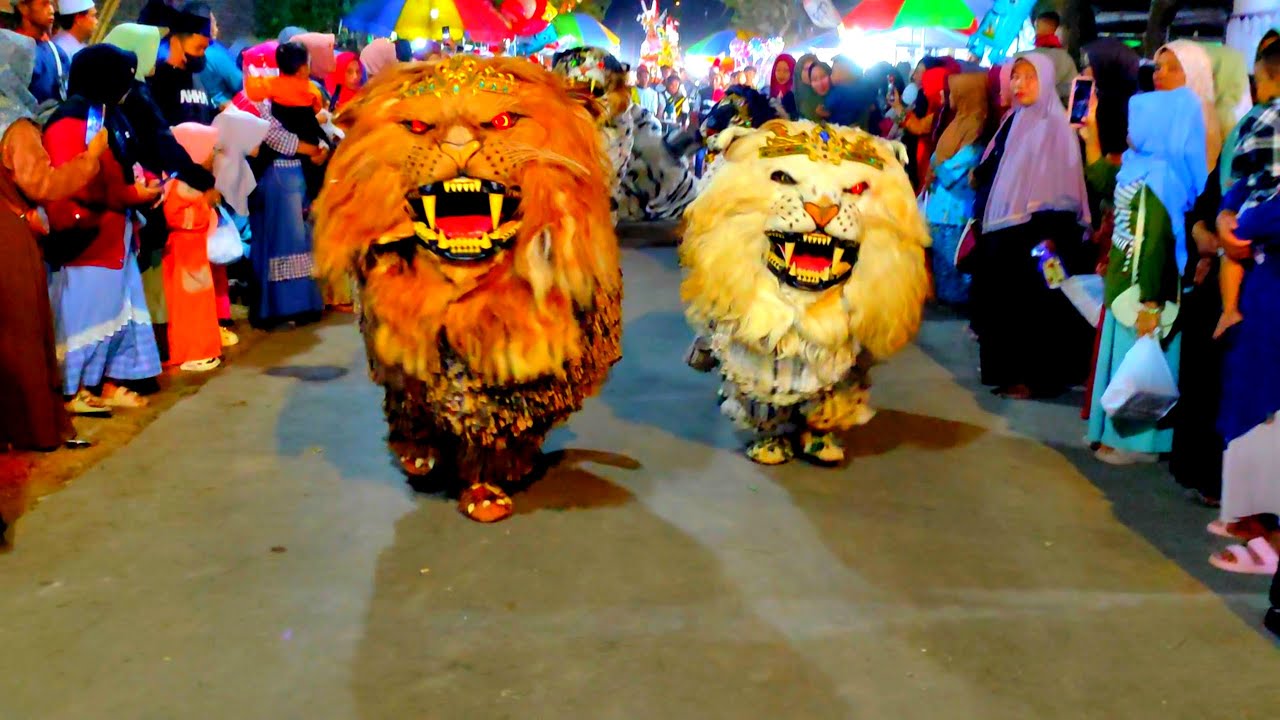 Kirab dan Atraksi Can macanan Singo Raung bersama drumband Sunda di Kajar Tenggarang