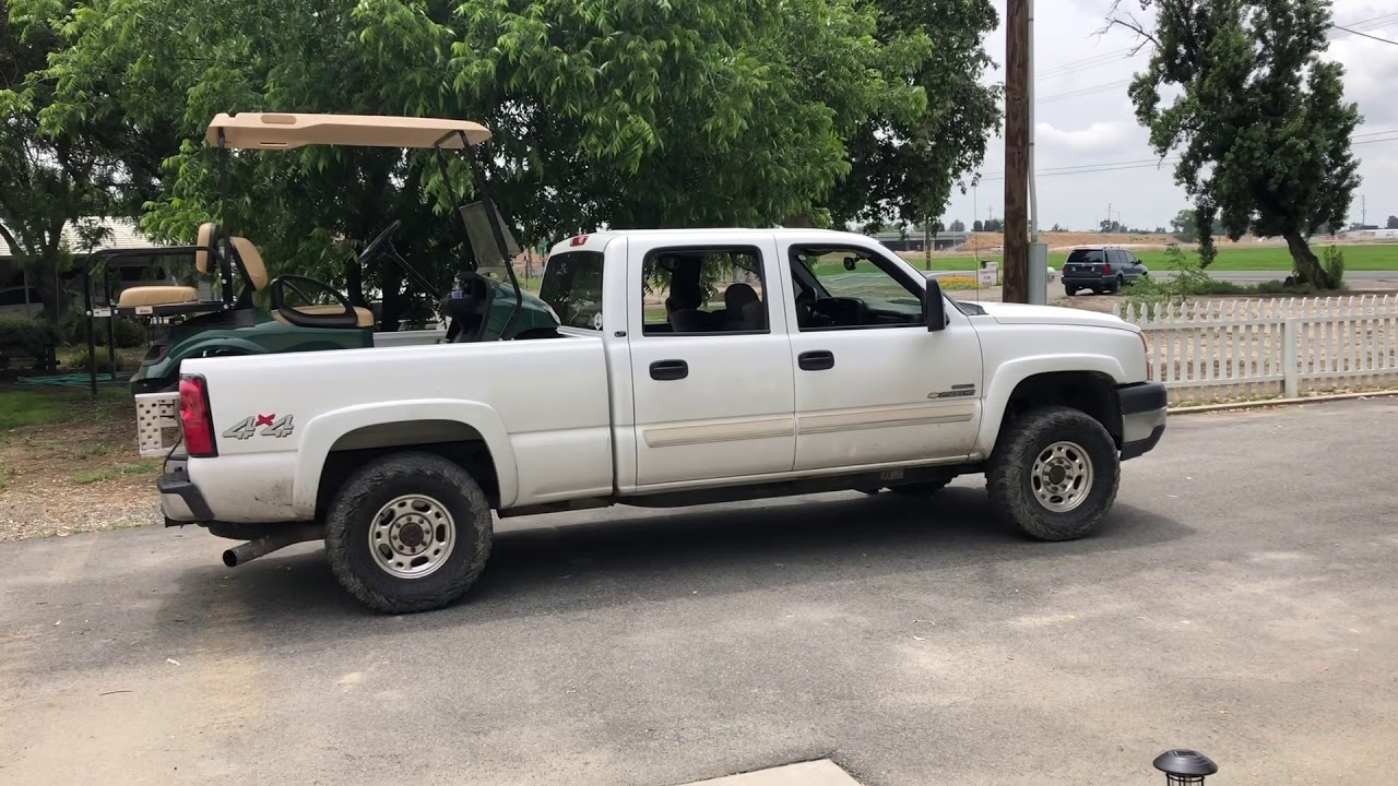 Golf cart loading or unloading from a pickup bed