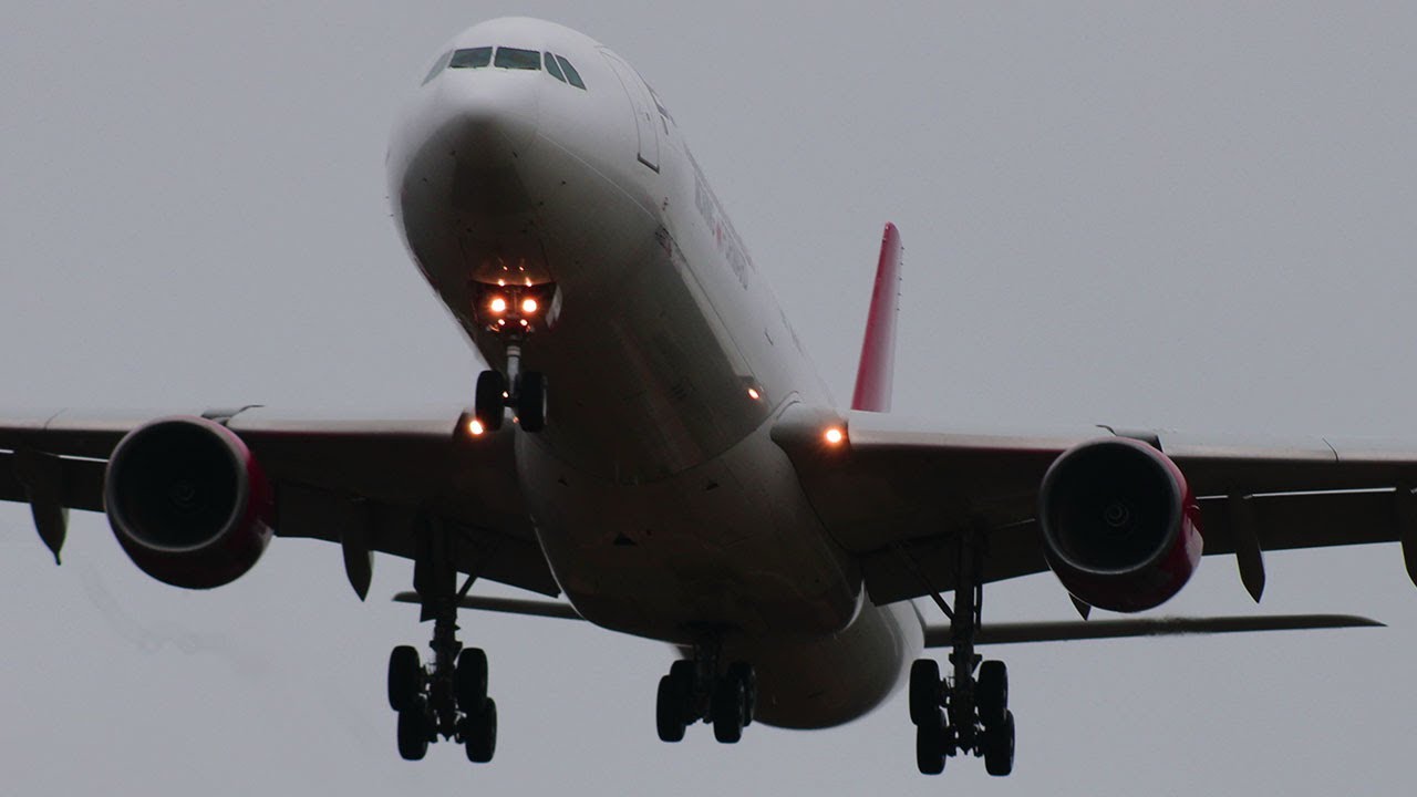 European cargo A340-642 landing into EGHH Bournemouth after long flight from Chongqing (sat show)