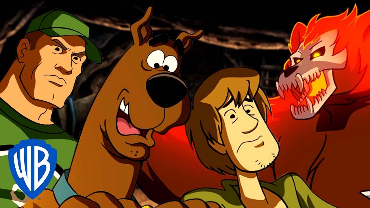 Scooby-Doo! en Français | Dans la tanière de l’ours fantôme ! Avec John Cena | WB Kids