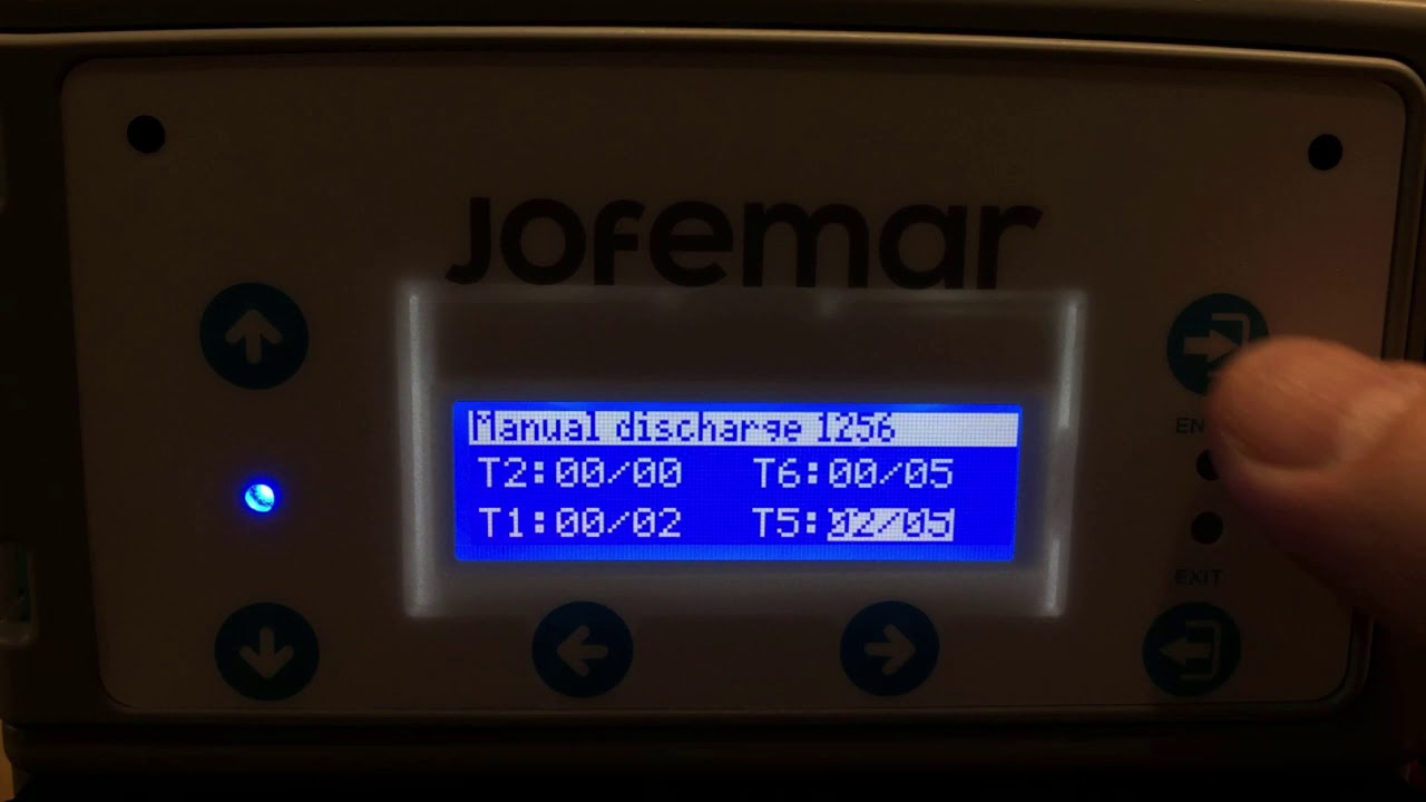 JF8 DISCHARGING COINS FROM INIVIDUAL TUBES