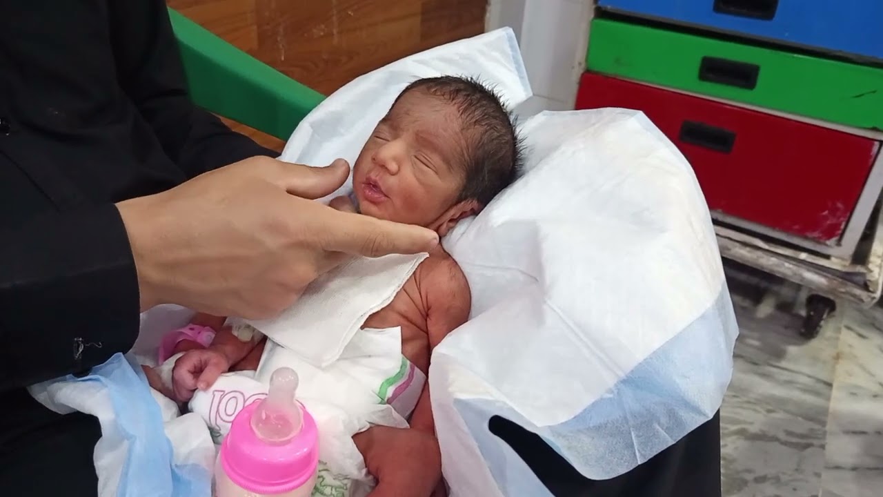 Baby Enjoying Bottle Feeding | Sweet Baby Moments