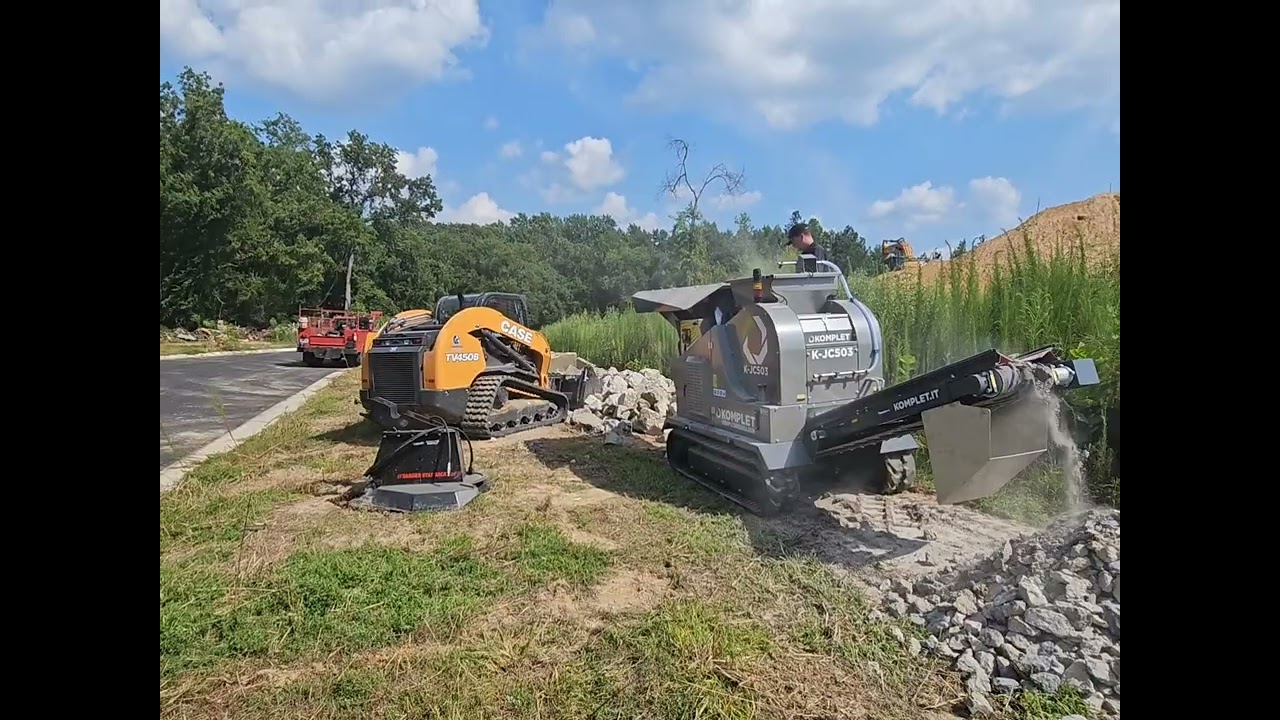 Concrete Crushing with a Case 450B and a Komplet JC-503