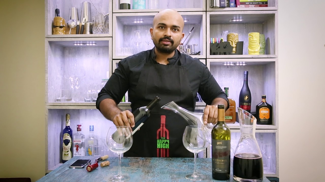 Decanting wine, why and how. Indian sommelier decants Indian wines from Reveilo and Grover Zampa
