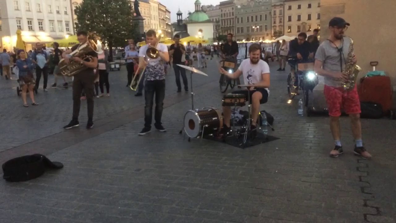 Kraków. Uliczni muzycy. Papa americano