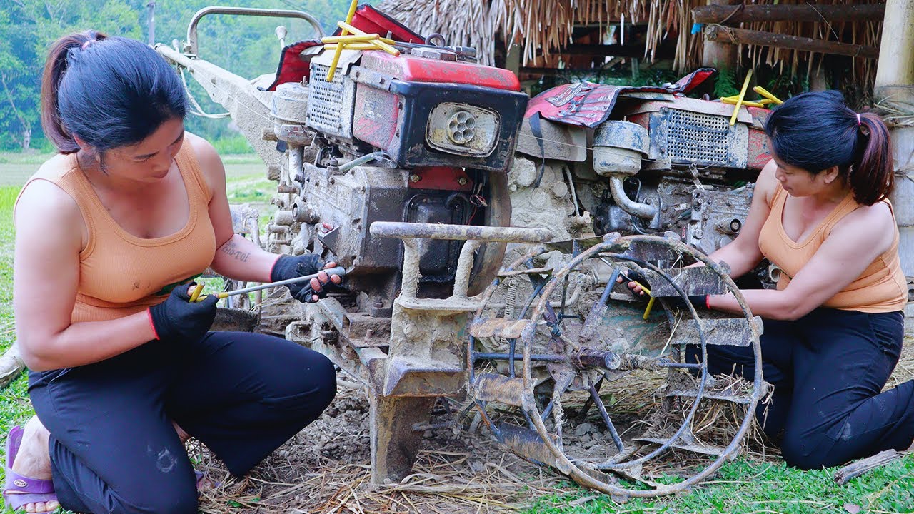 Mechanic girl repairs and restores walking tractor, mechanical genius girl, blacksmith girl