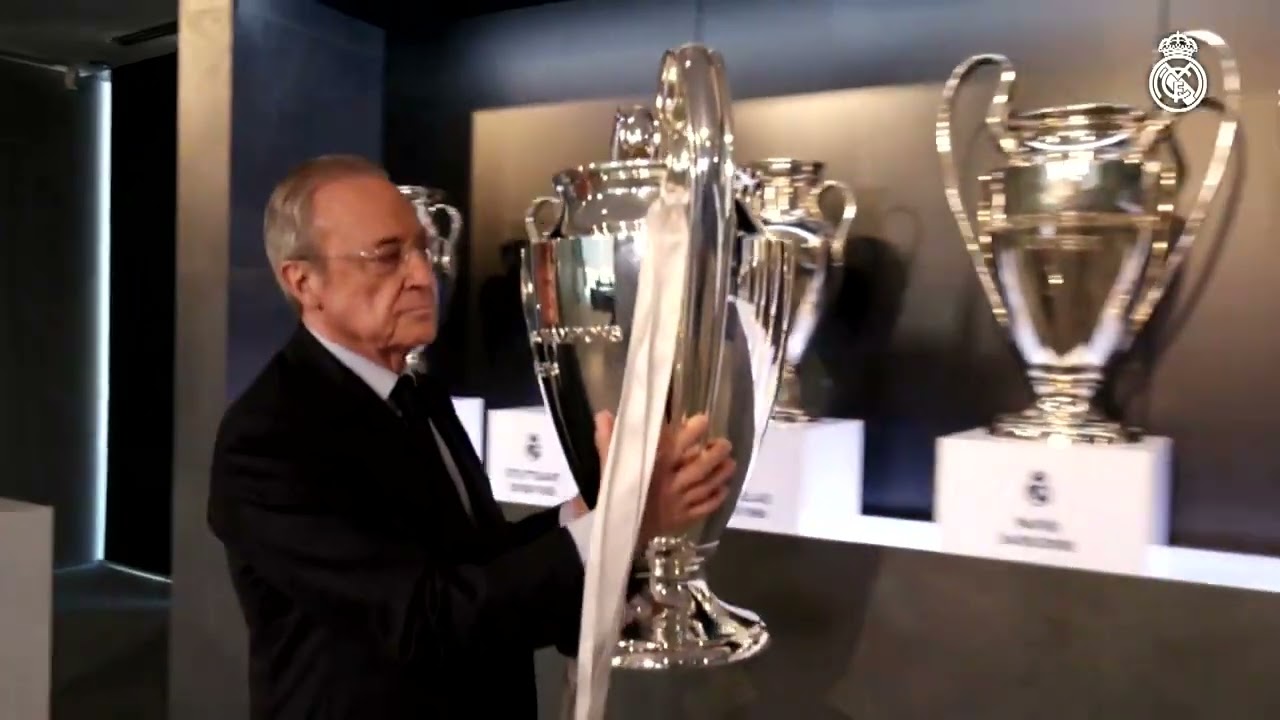 Florentino Perez places the 15th Champions League trophy in Real Madrid's trophy cabinet #halamadrid