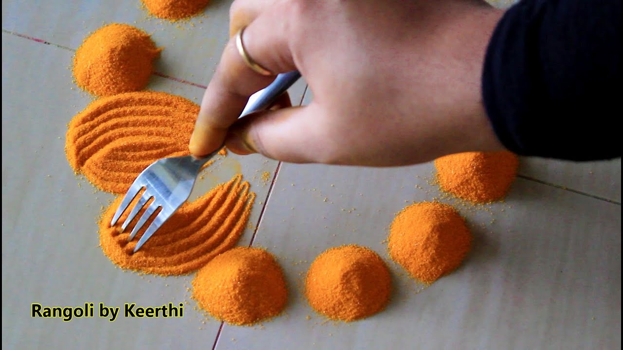 Simple diya rangoli for diwali using fork l diwali special rangoli design l Rangoli by Keerthi