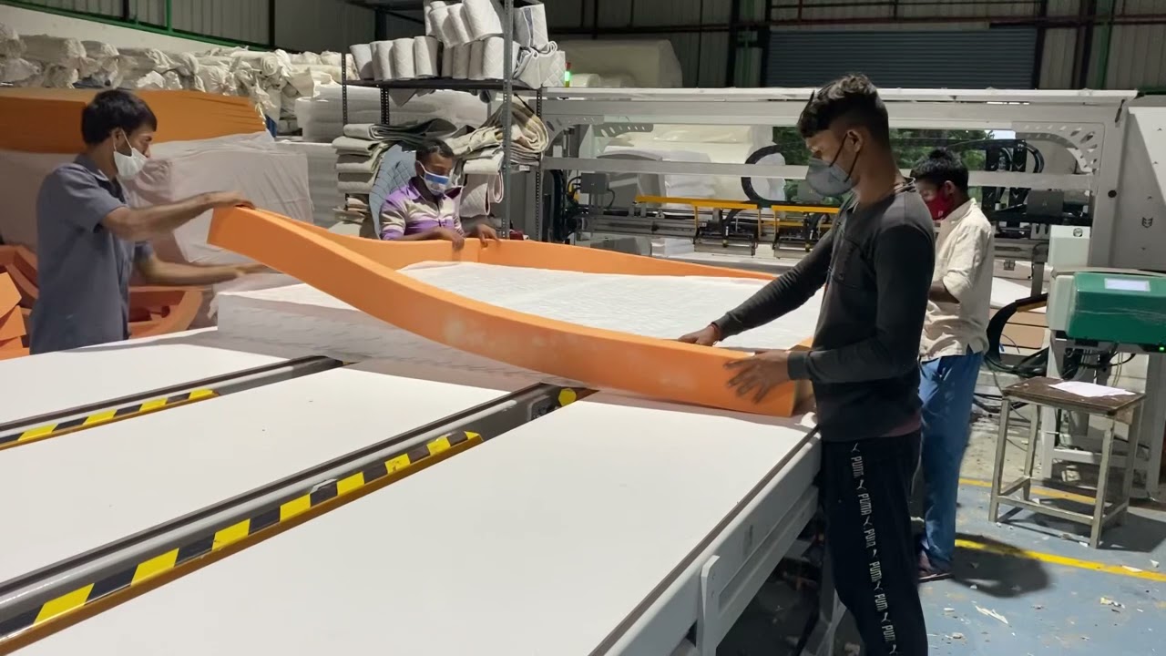 Assembling a pocketed spring mattress