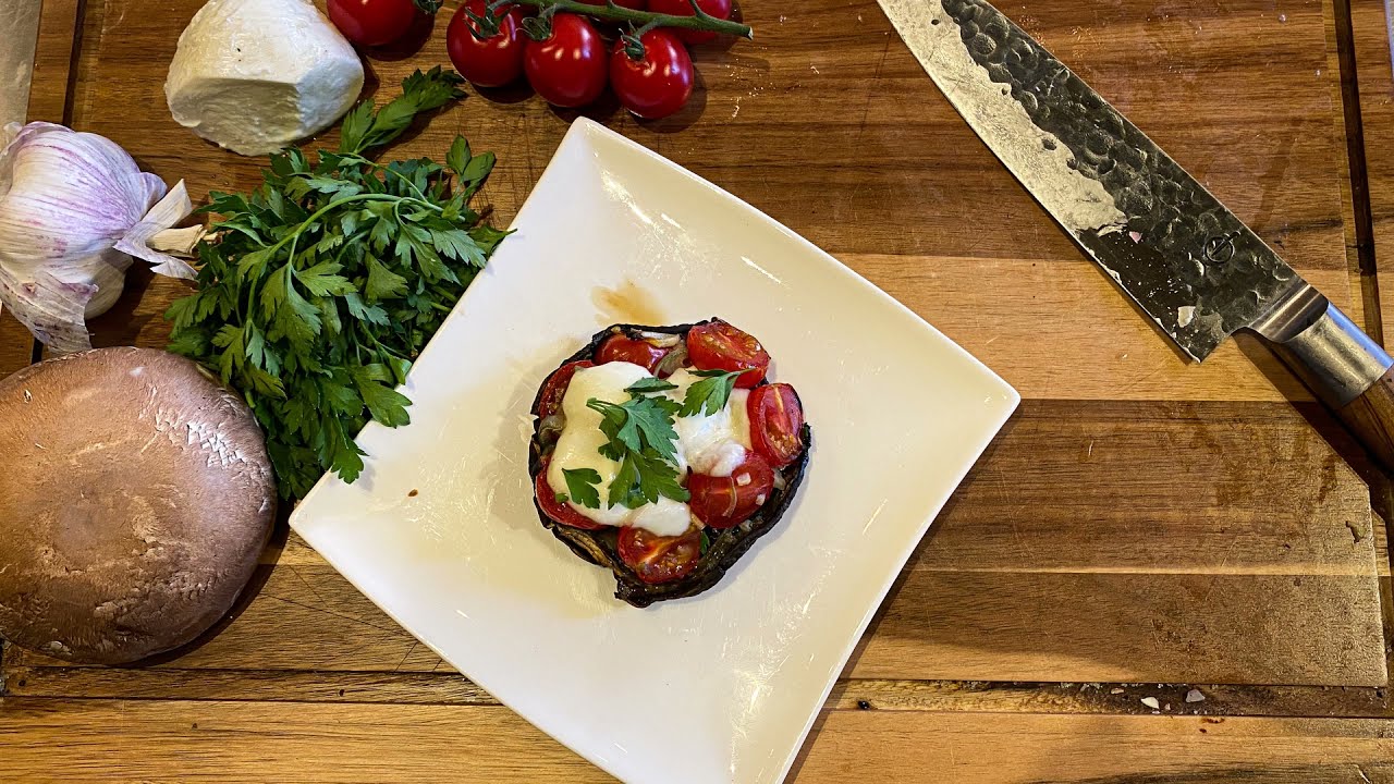 Gevulde portobello met tomaatjes en mozzarella