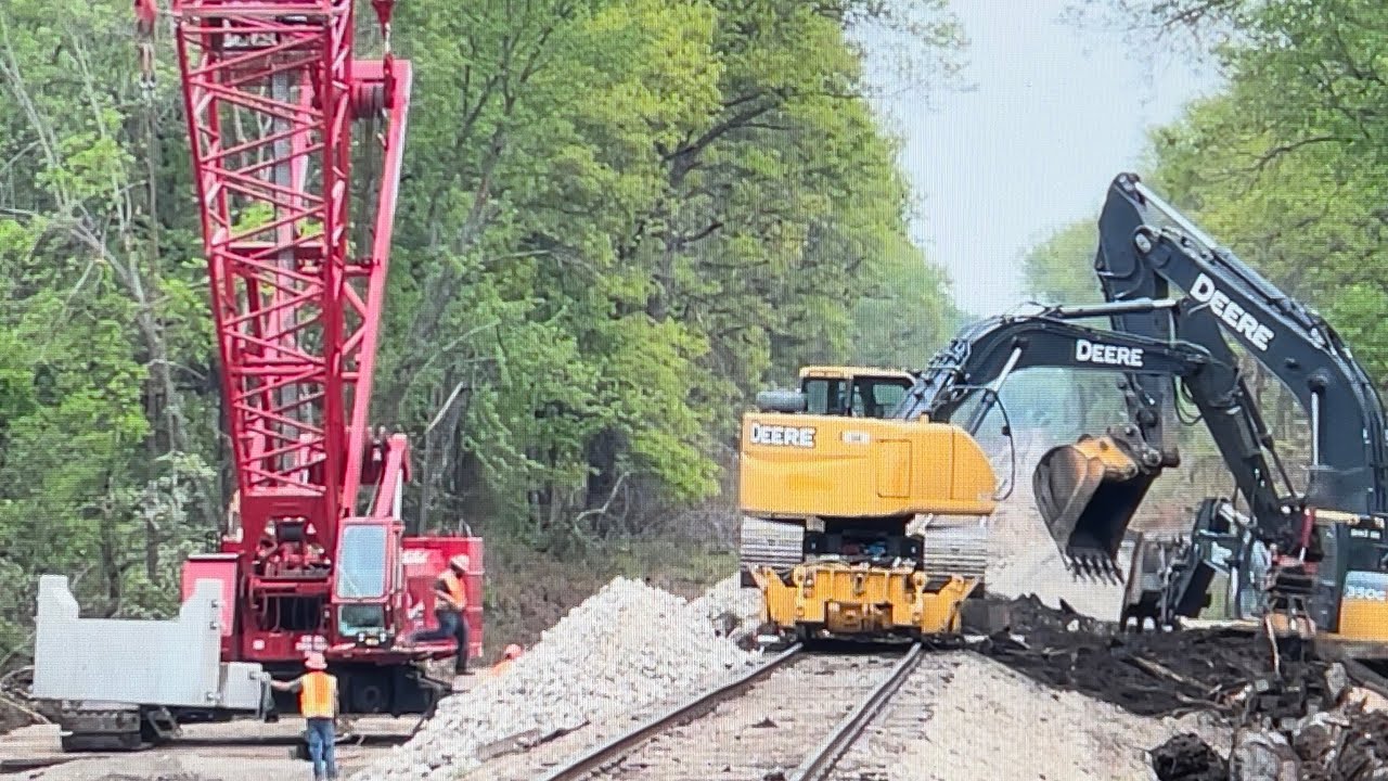 Excavators, Crain LG Pike build trestle for Watco at Brush Creek Weir, Kansas