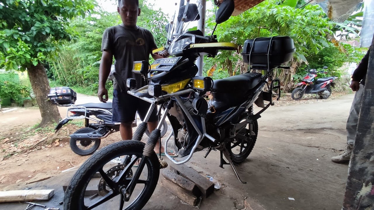 PEMASANGAN PENINGGI SUPRA X 125 DEPAN AS SATRIA FU BELAKANG +10CM ADVENTURE SUPRA JINJIT BAPAK