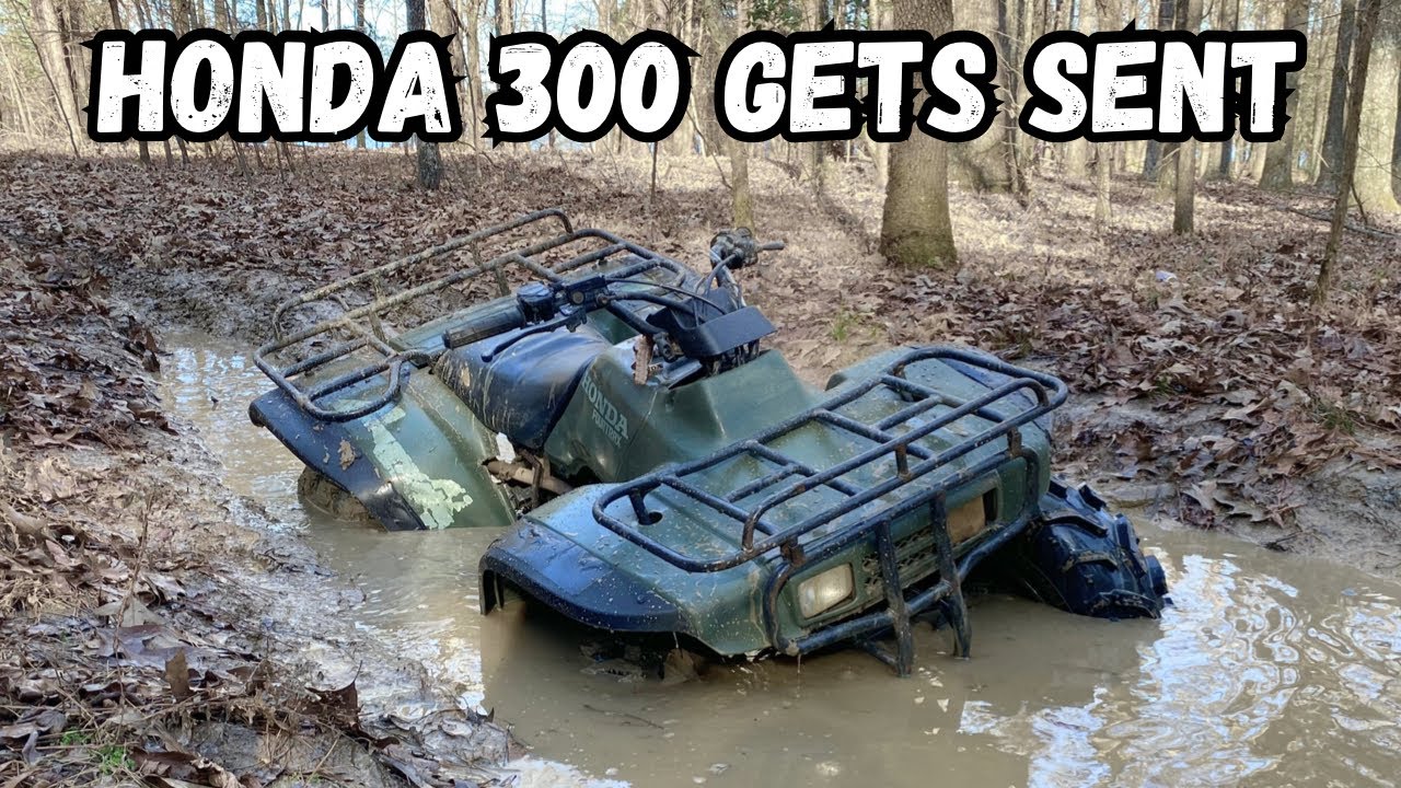 Honda 300 GETS SENT IN THICK MUD!