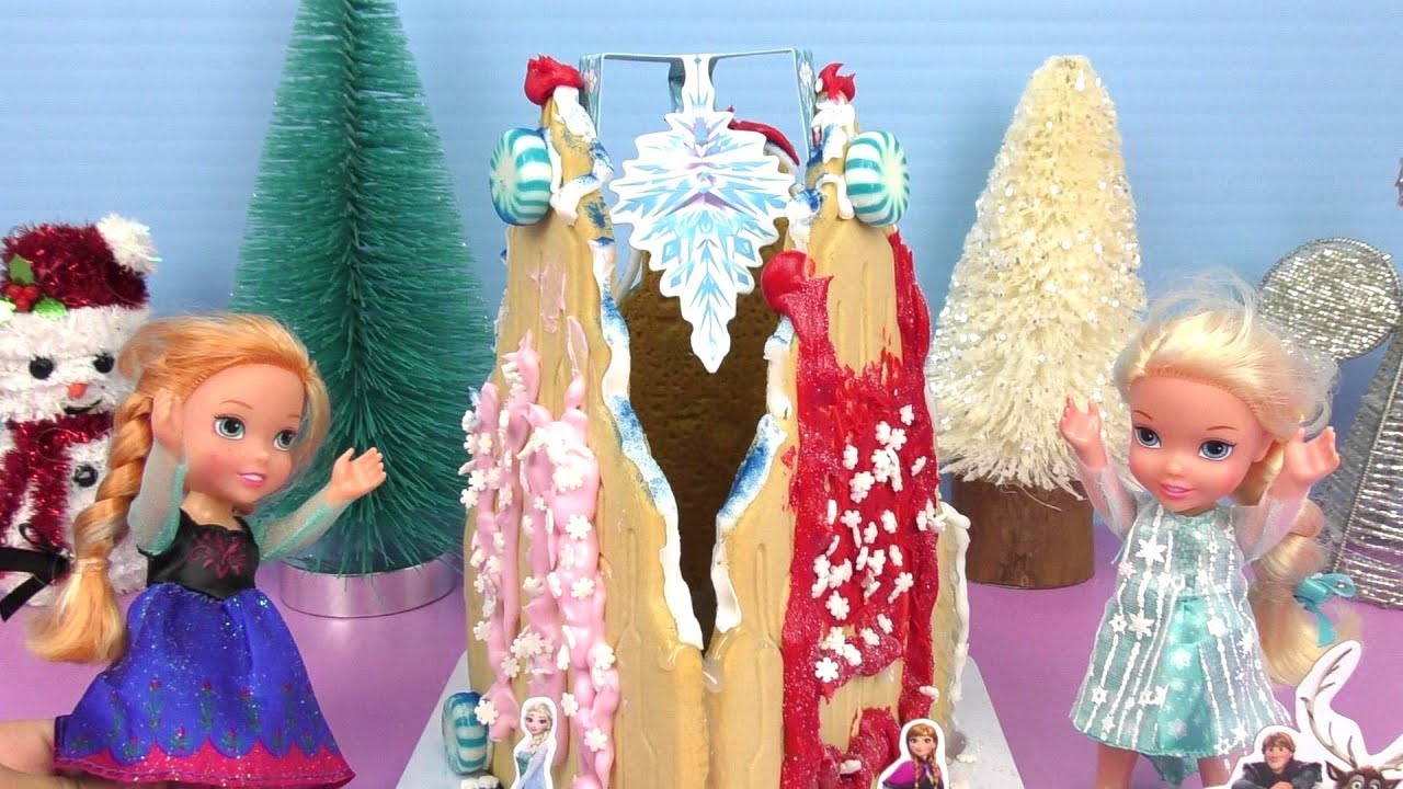 Gingerbread castle ! Elsa & Anna toddlers build a sugar cookie house