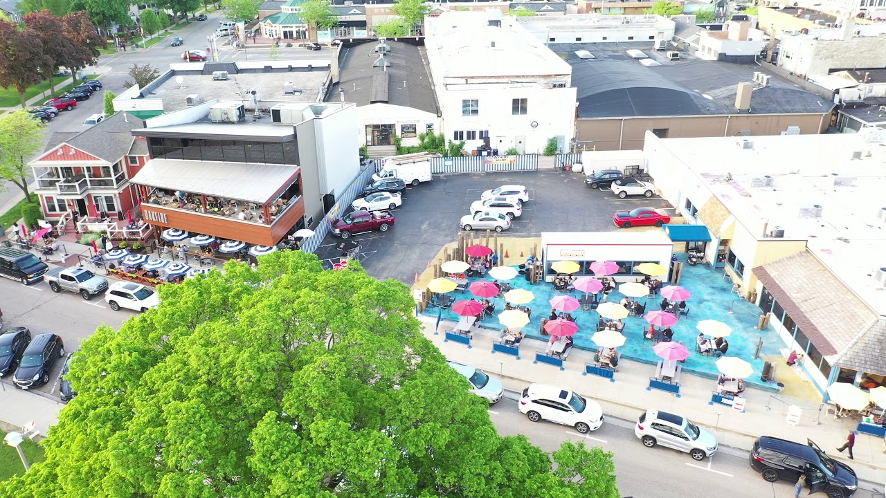 Lake Geneva Drone VIdeo of Riviera, lake, resort area, boats, downtown businesses and public beach.