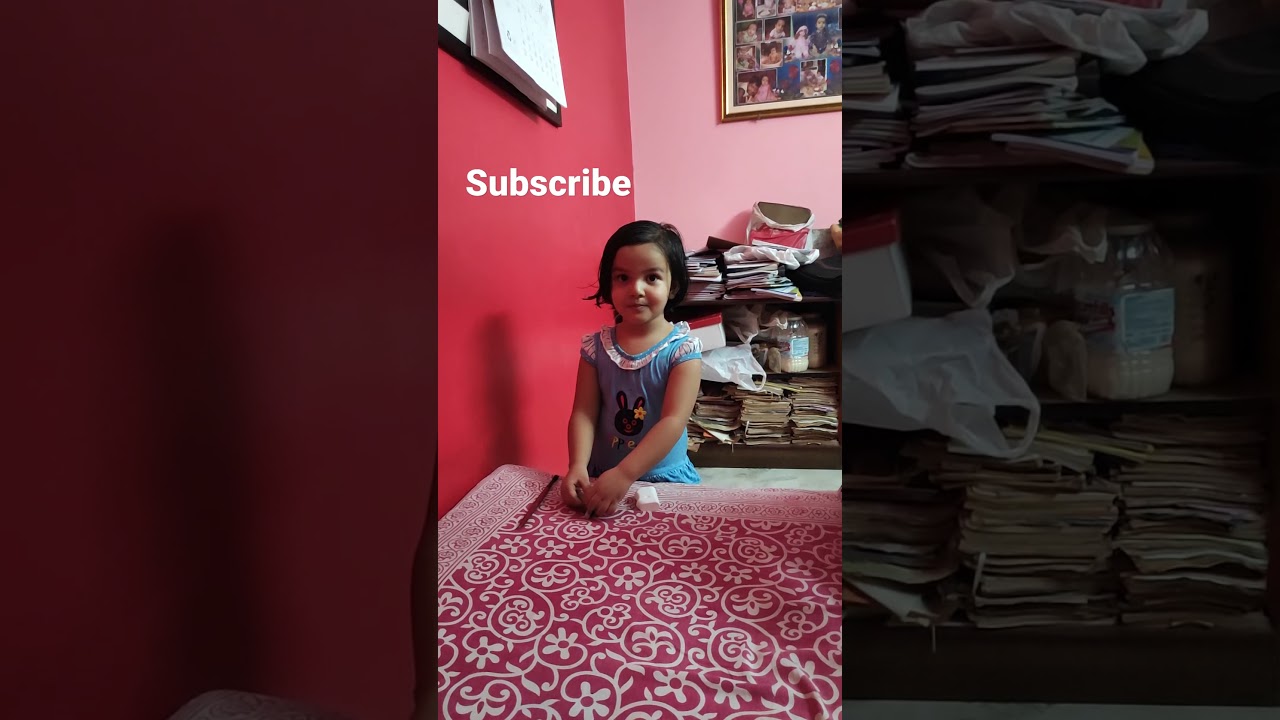 Cute little girl's fake makeup