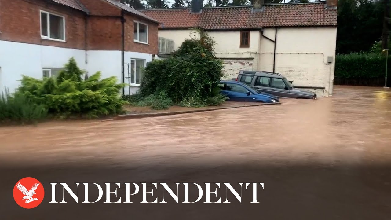 Pub and houses flooded as deep water rushes down road in Nottinghamshire village