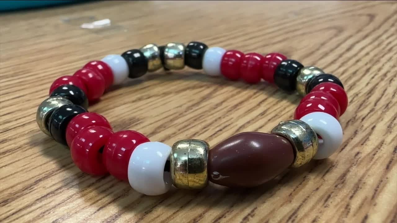 Cypress Woods ESE students continue tradition by making Super Bowl bracelets
