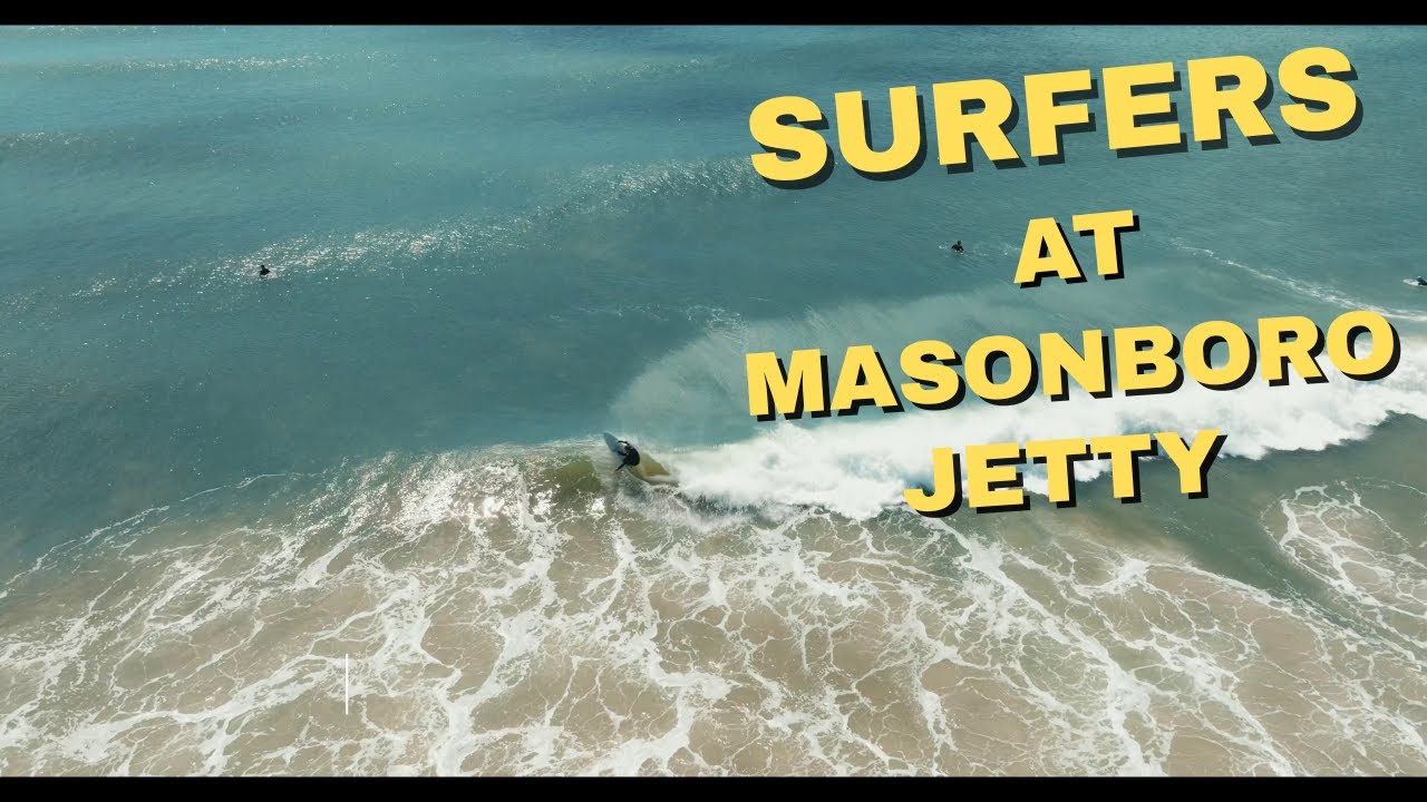 Surfers At Masonboro Jetty