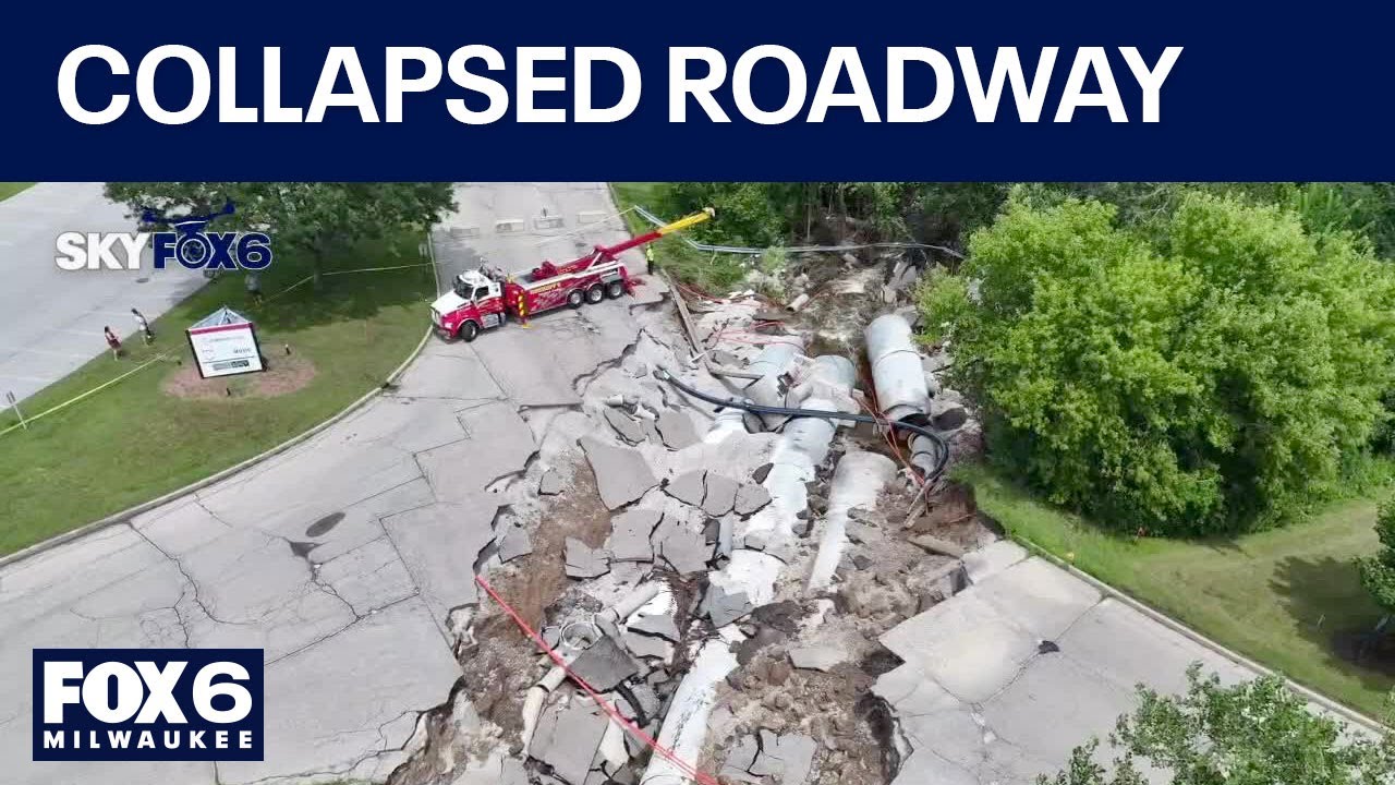 Waukesha County roadway collapses amid serious flooding | FOX6 News Milwaukee
