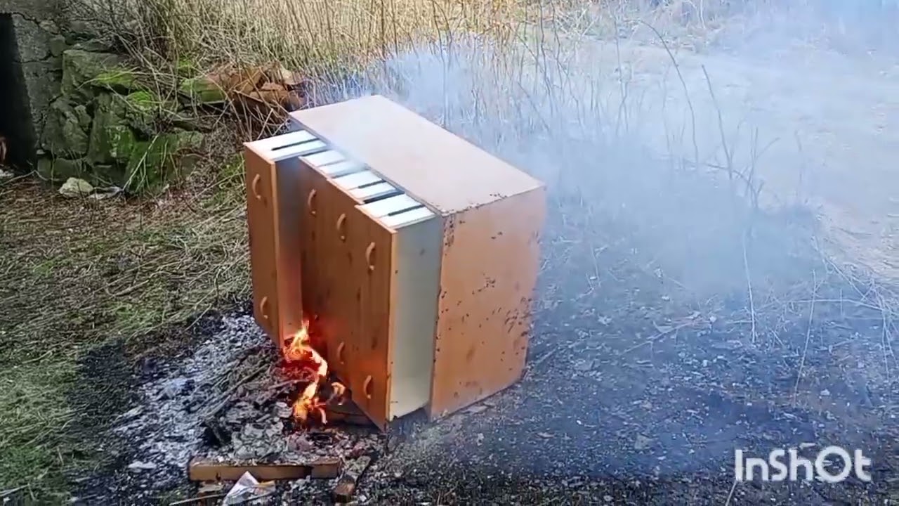 Burning old furniture outside the Barn 