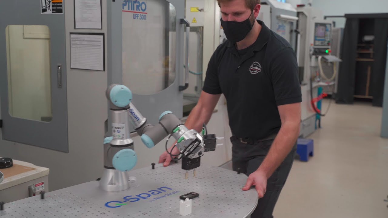 Universal Robots and New Scale Robotics Automate Quality Control in Precision Optics Manufacturing