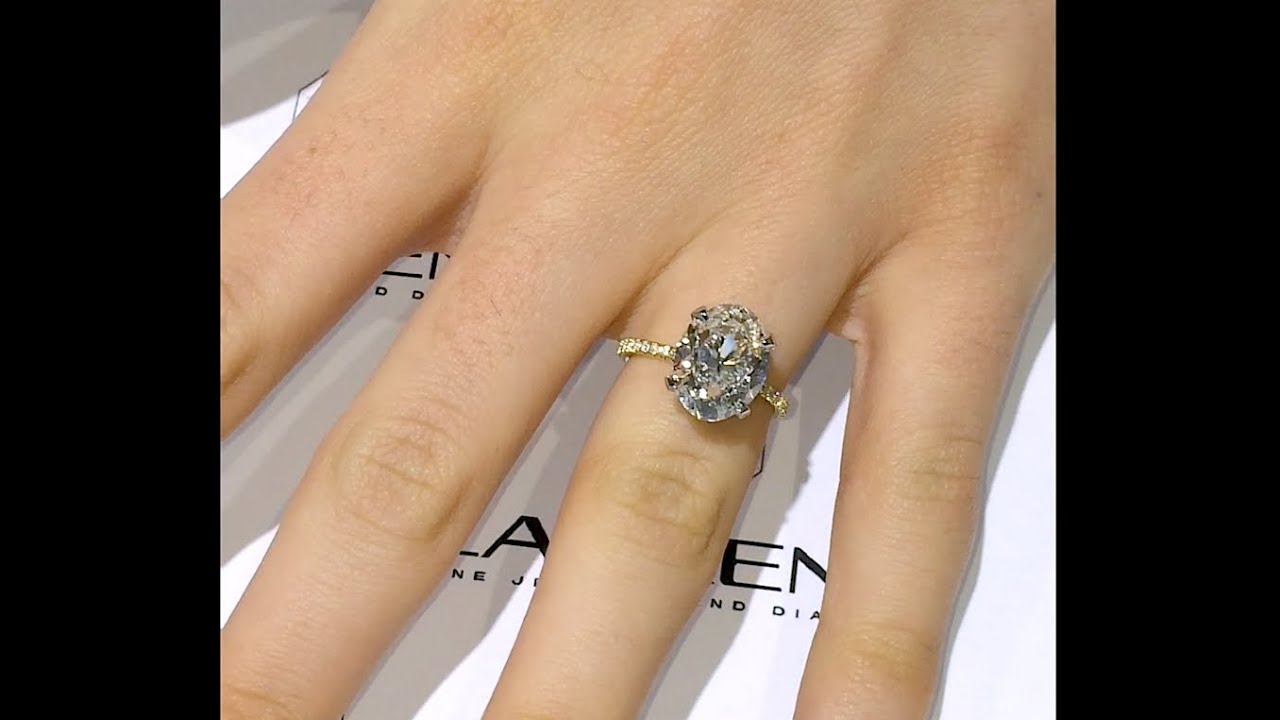 5 carat Oval Diamond Engagement Ring in Yellow Gold and Platinum