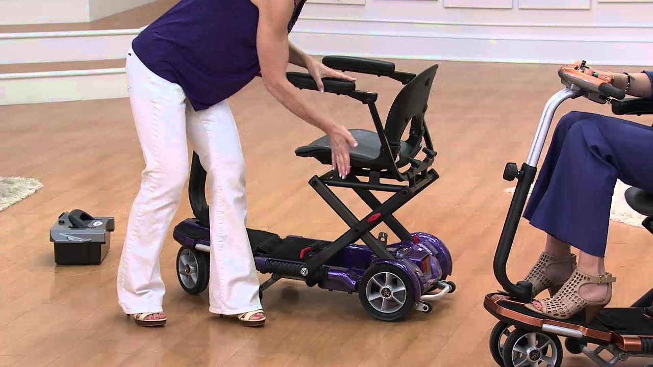 EV Rider Folding Mobility Scooter with Arm Rests with Albany Irvin