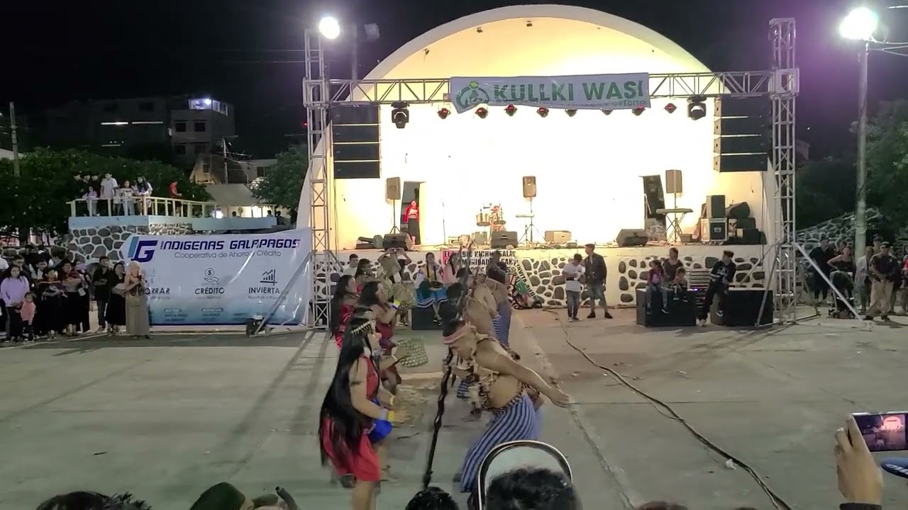 Shuar indigenous dancers performing at Inti Raymi celebration